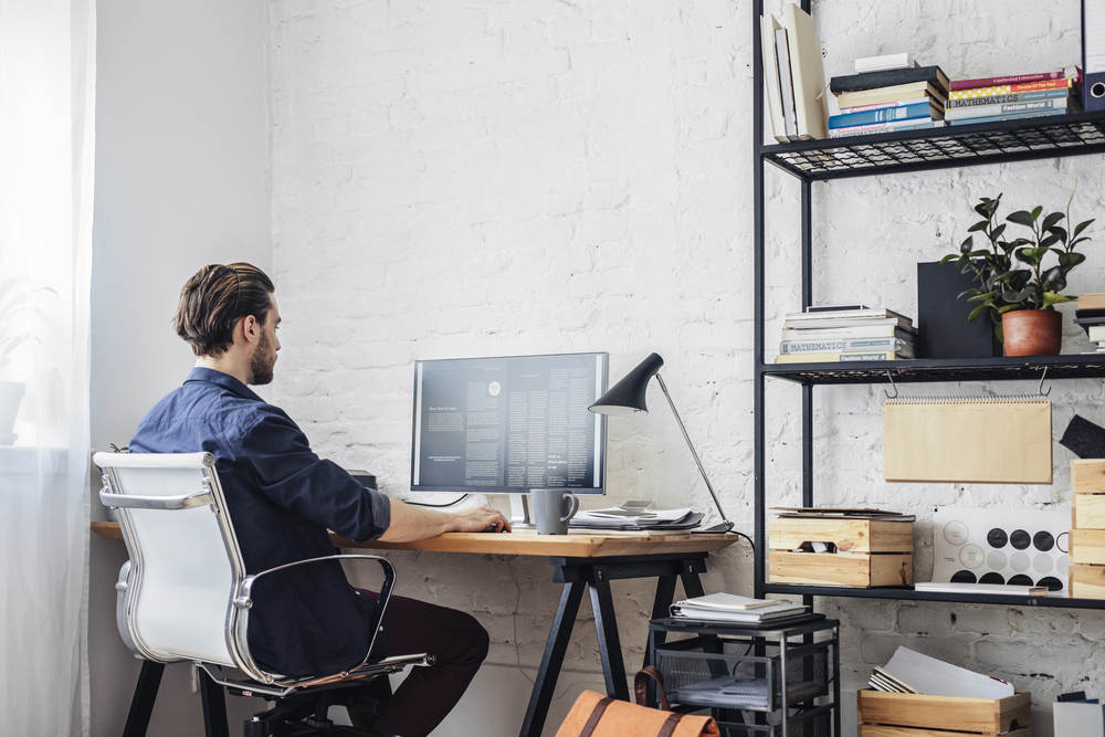 Young,Man,Working,On,His,Computer (Home Office)